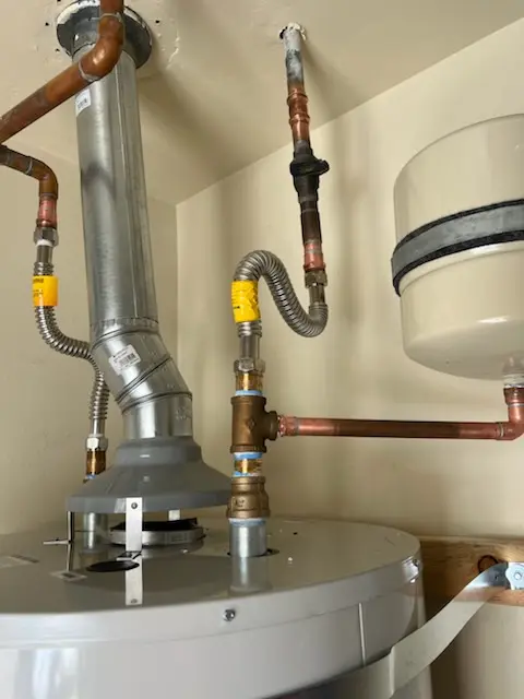Water heater installation and plumbing repair in The Bluffs
